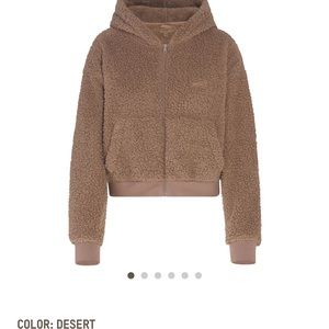 SKIMS teddy zip up hoodie (size small in color-desert)